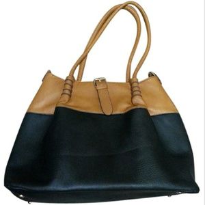 Wilsons Leather black rivet Black and Brown purse.